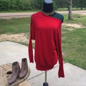 Red studded sweater